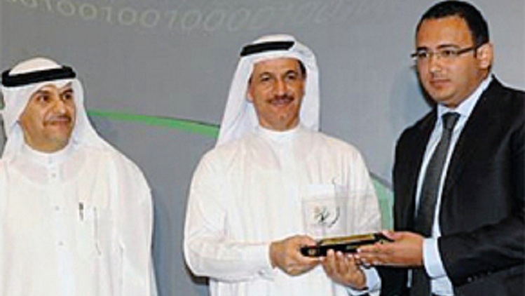 Fathi Ben Grira, CEO of MENACORP, receiving an award from the Minister of Economy His Excellency Sultan Bin Saeed Al Mansoori and from the CEO of the SCA, Abdullah Al Tarifi